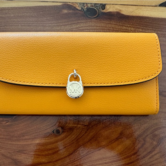 Michael Kors Orange Wallet with Silver Detail - Picture 1 of 7